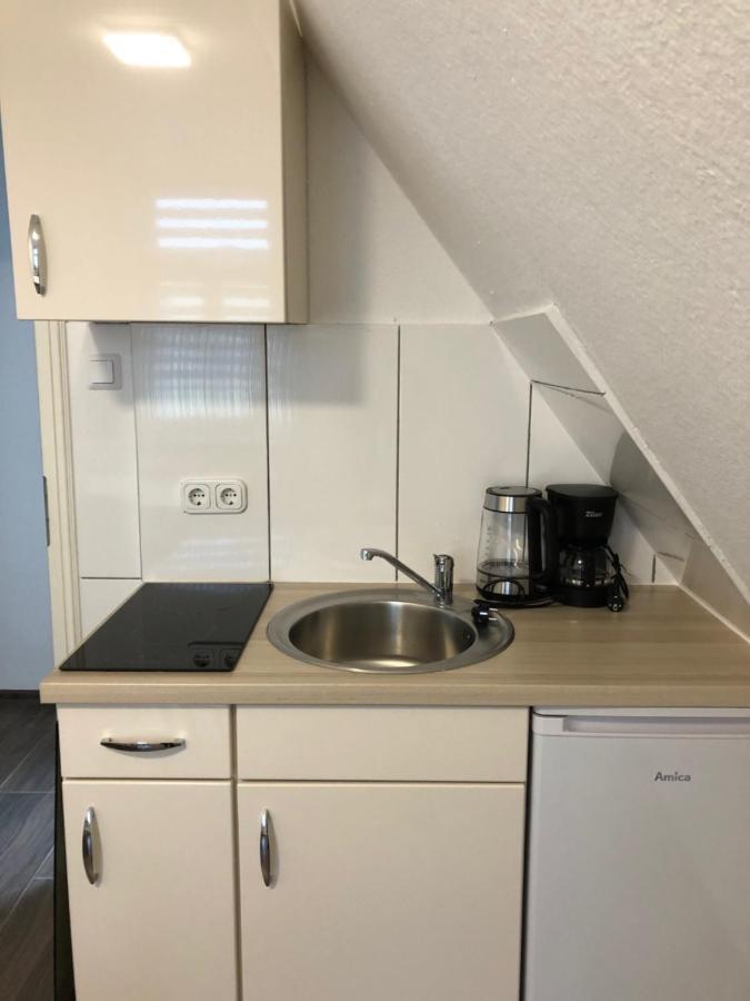 Apartmenthaus Am Bahnhof 代特莫尔德 外观 照片