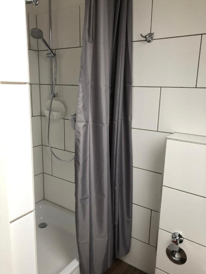Apartmenthaus Am Bahnhof 代特莫尔德 外观 照片
