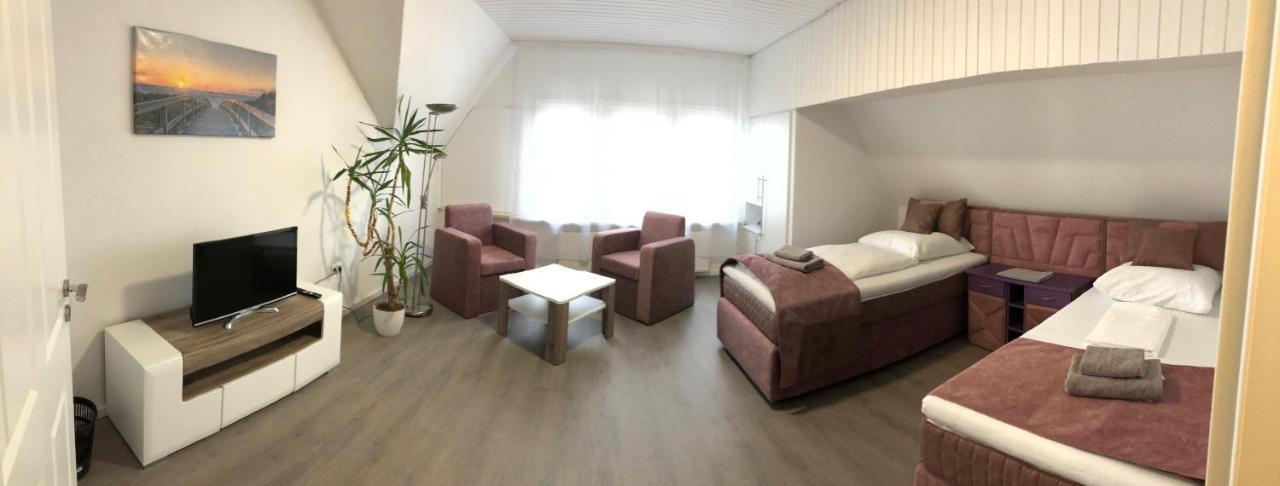 Apartmenthaus Am Bahnhof 代特莫尔德 外观 照片